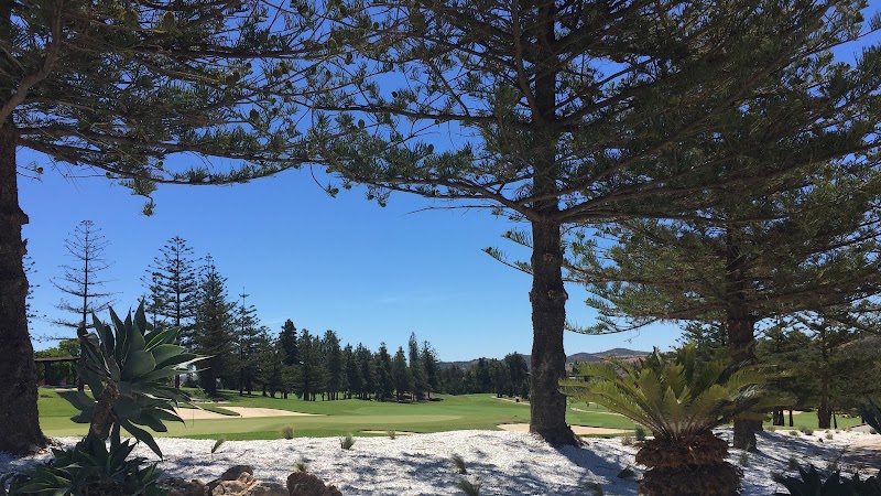 Mijas Golf Los Lagos parkland fairway framed by pines, Costa del Sol, Spain