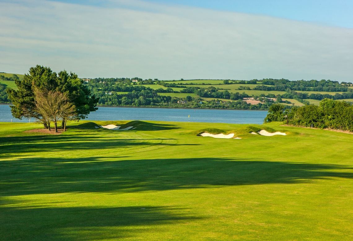 Cork Golf Club at Little Island, parkland fairways and old limestone quarry walls on Cork Harbour, Ireland