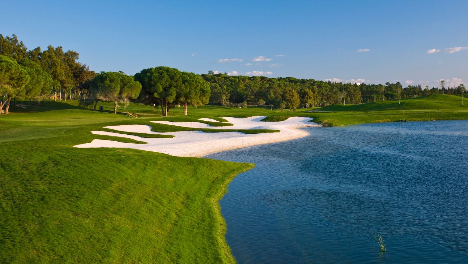 Quinta do Lago Laranjal golf course, fairway among orange groves and umbrella pines in the Algarve
