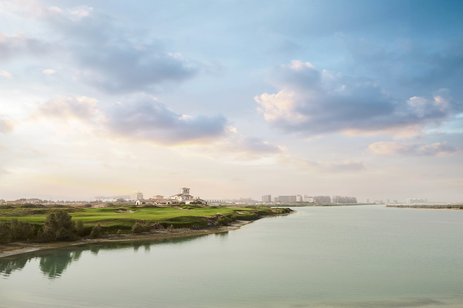 Yas Links Abu Dhabi, links fairway and bunkering running along the coast of Yas Island, United Arab Emirates