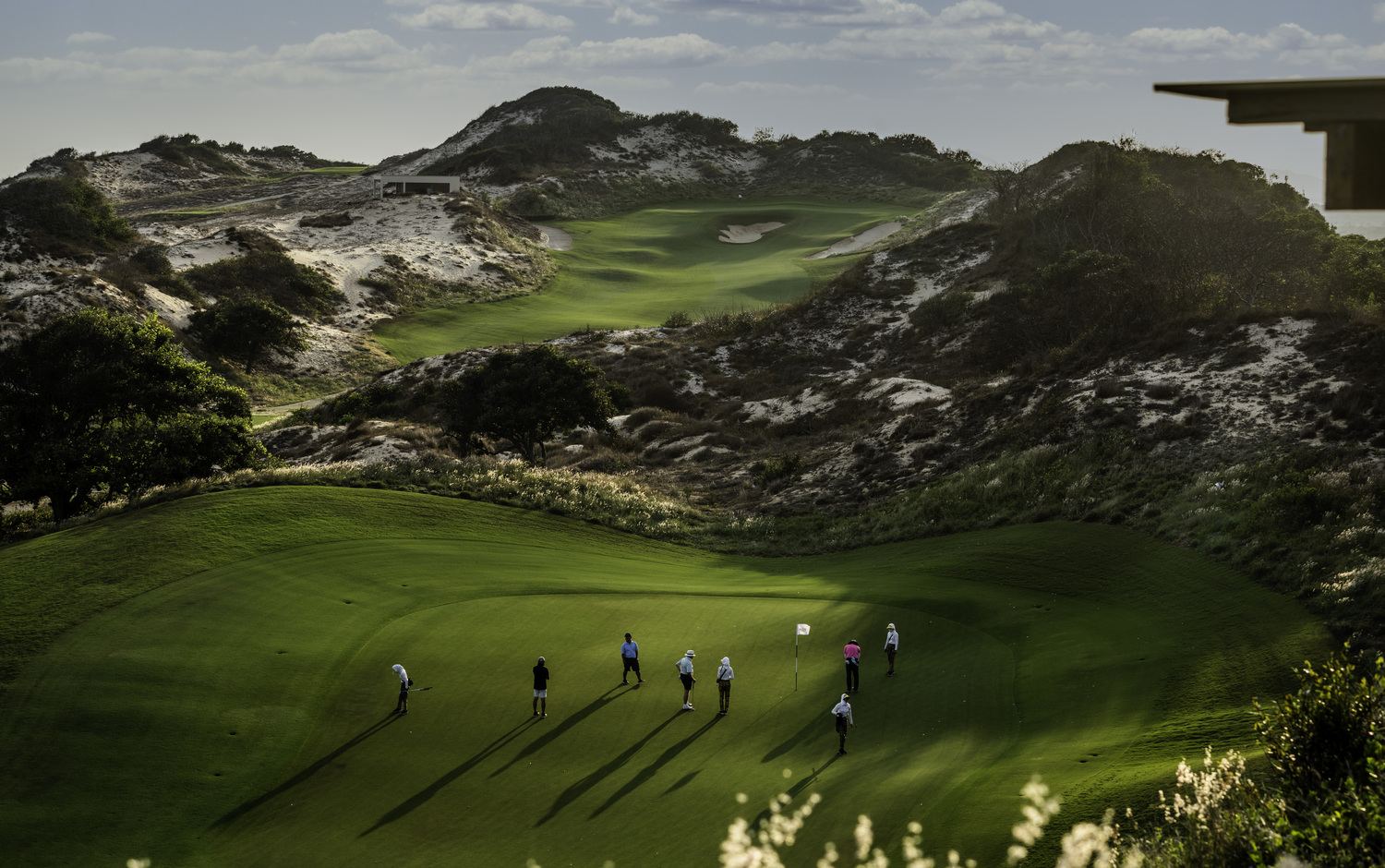 The Bluffs Ho Tram, links fairway among tall sand dunes above the South China Sea, Vietnam