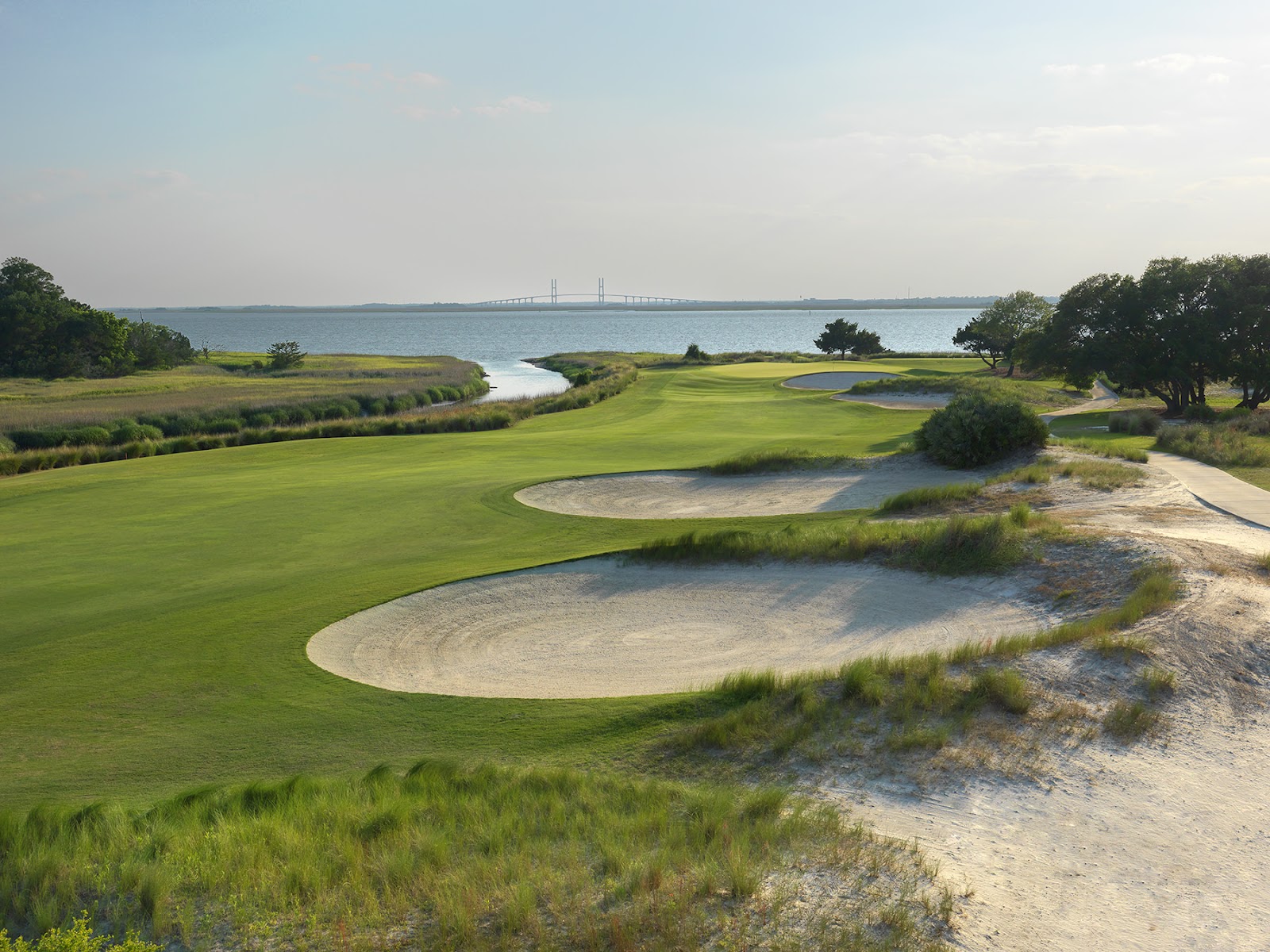 Sea Island Seaside Course, links style fairway through tidal marsh on St Simons Island, Georgia