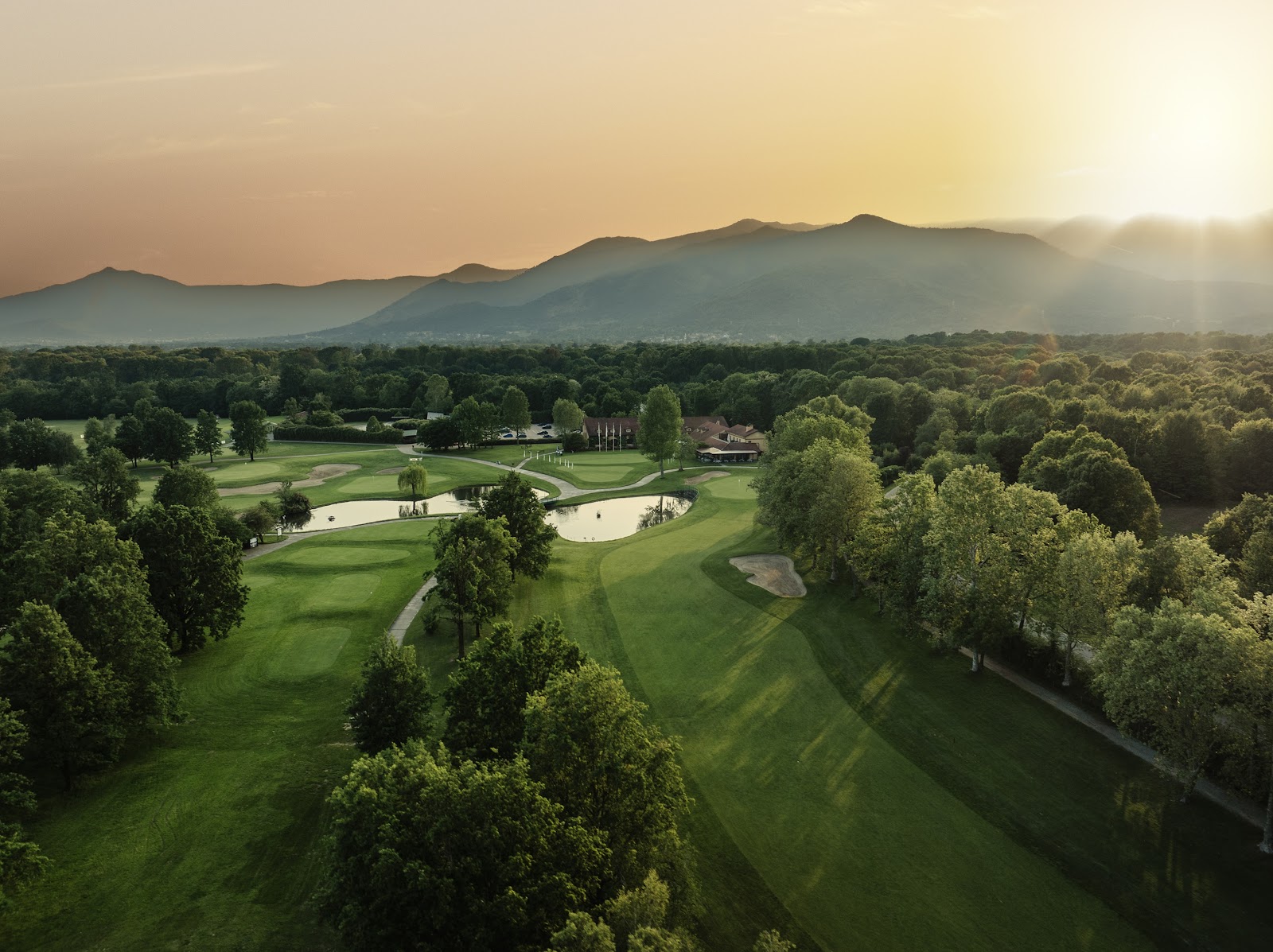 Royal Park I Roveri, fairways inside the La Mandria park with the Alps beyond