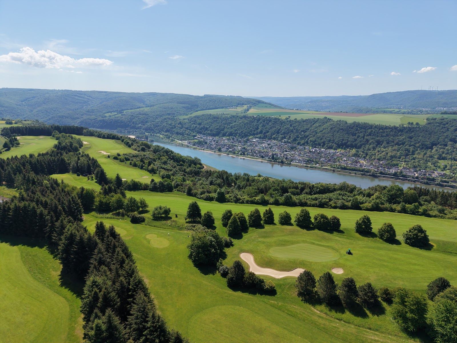 Jakobsberg golf course above the Rhine gorge near Boppard, fairways between forest and vineyards