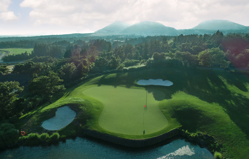 Pinx Golf Club fairways with Hallasan volcano views on Jeju Island