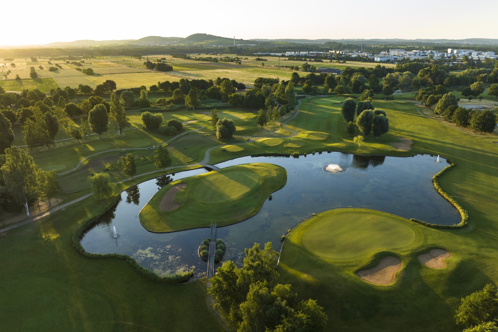 Parkland golf course in Germany under summer light, illustrating the best months to play golf in Germany