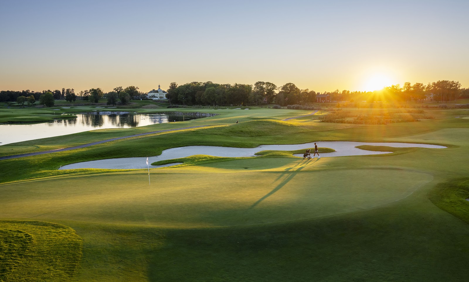Parkland golf course in Sweden under long summer light, illustrating the best months to play golf in Sweden