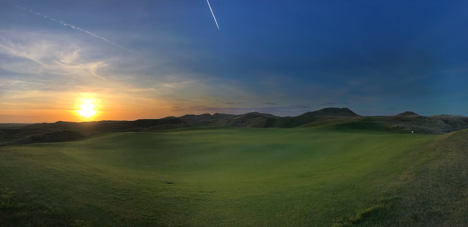 Carne Golf Links, green sitting low in the Belmullet dunes at sunset, County Mayo