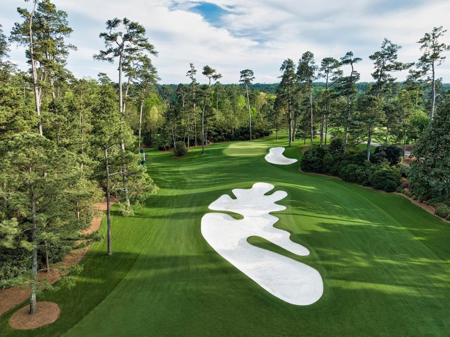 Augusta National Golf Club fairway framed by pines, home of the Masters, Georgia